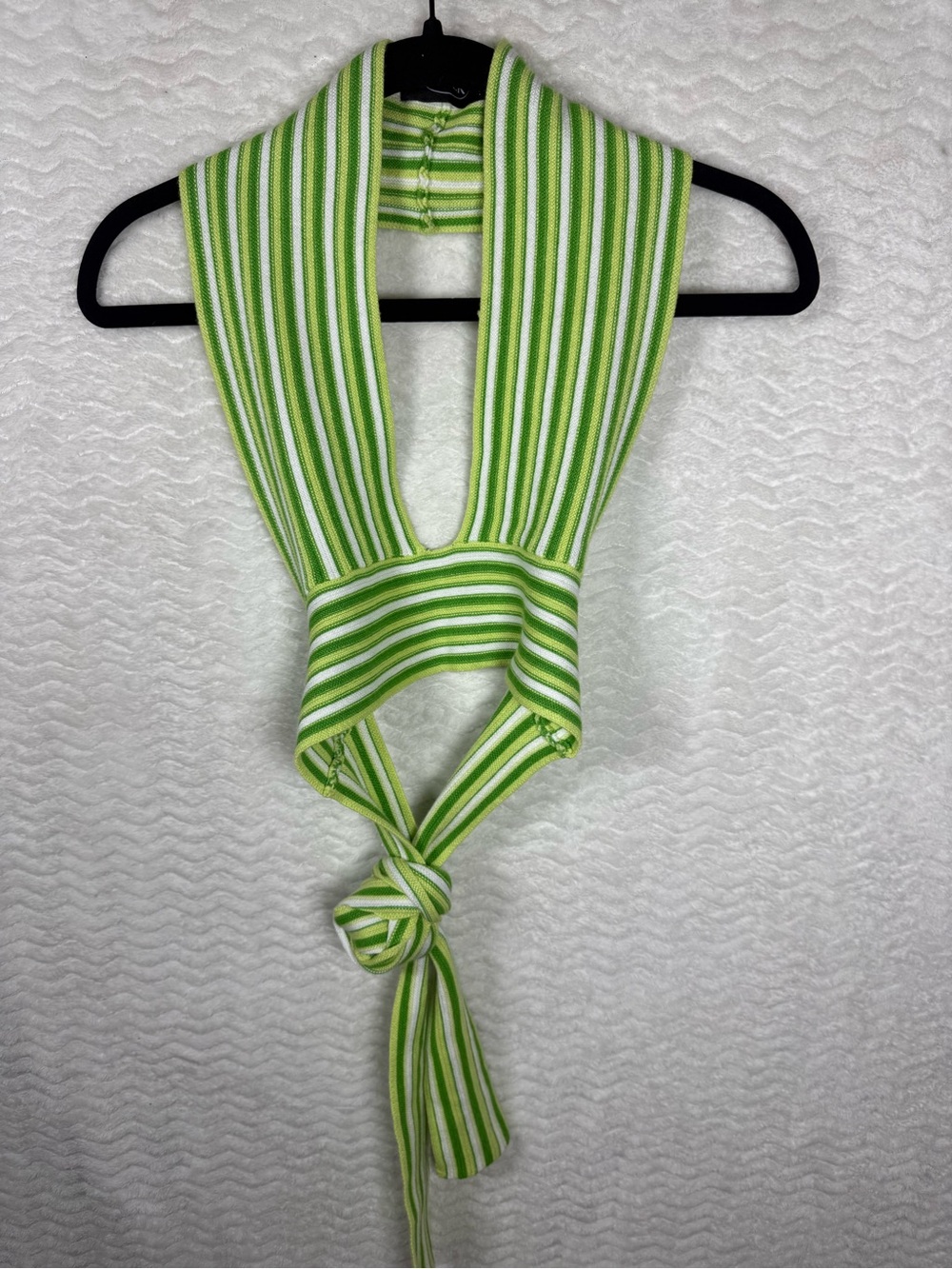 Cider striped halter top features a distinctive tie-back design vibrant green